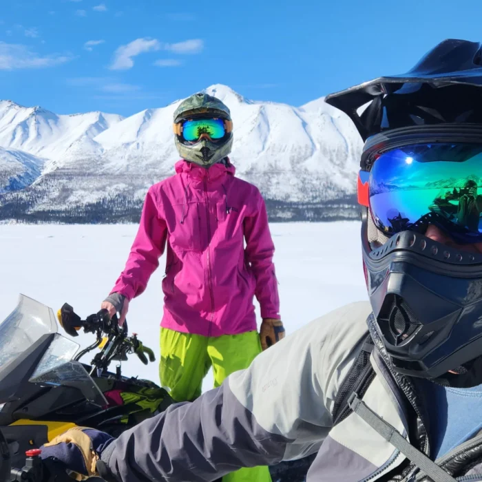 nelchina glacier snowmobile riders closeup