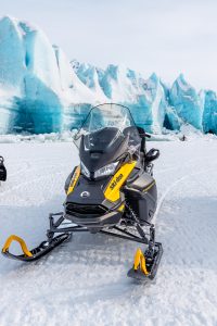 Expedition Sport 900 ACE at the face of Spencer Glacier with Alaska Snowmobile Tours and Rentals.